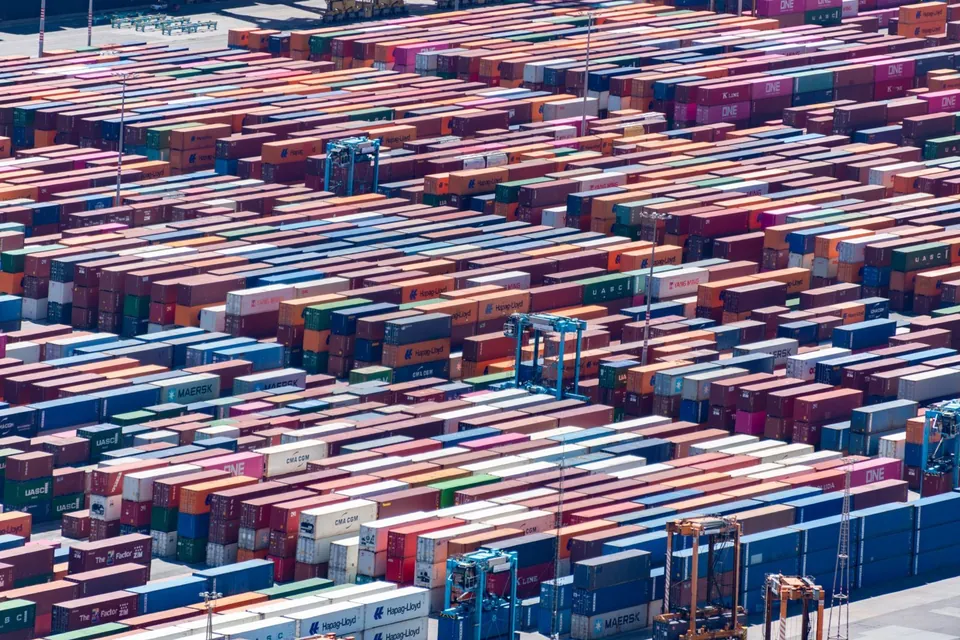 Aerial view of stacked containers at a shipping port