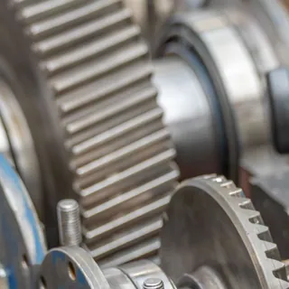 Close view of metal gears and machine components